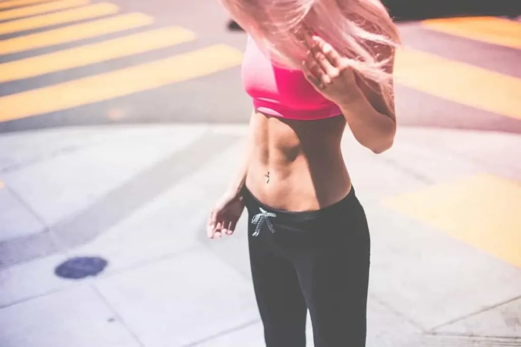 Woman with toned stomach after LA-EMS Body Sculpting Treatment Bagshot